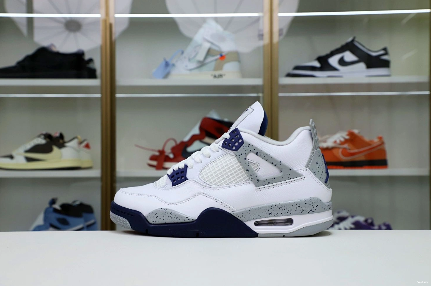 JORDAN 4 RETRO NAVY